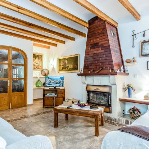 Gather together in the cosy living room, around the old hearth