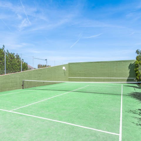 Play a game or two of tennis on the private court