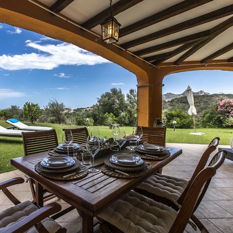 Tuck into tasty Sardinian cuisine around the alfresco dining table