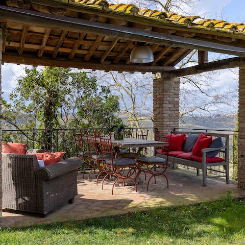 Admire the gorgeous Tuscan views from the alfresco dining area