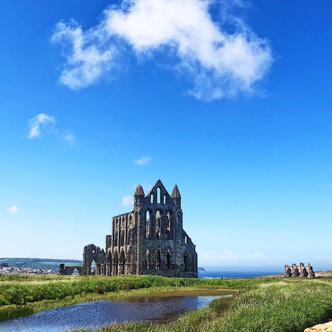 Visit Whitby Abbey, the inspiration for Bram Stoker's 'Dracula', under a fifteen-minute walk away