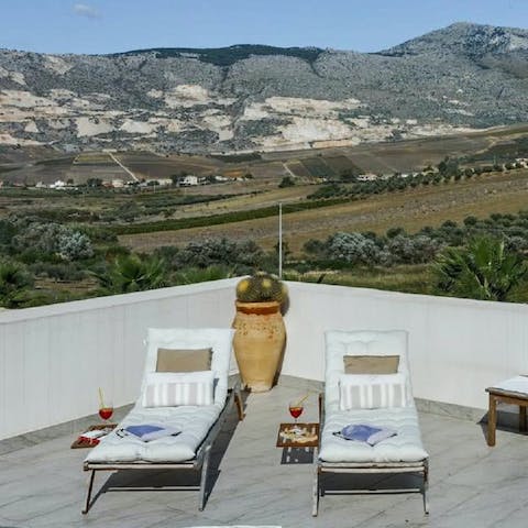 Enjoy views of the Sicilian mountains from the terrace