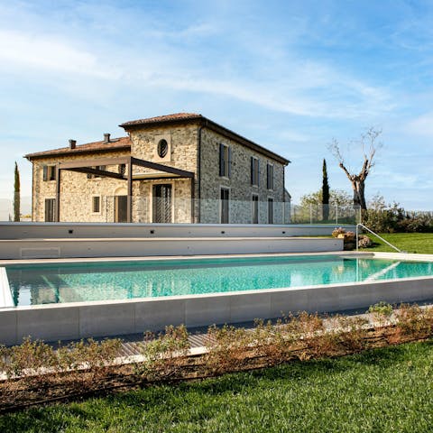 Swim laps in your private pool to escape the summer heat