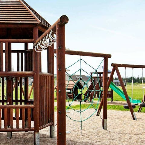 Let the children have fun in the communal playground area 