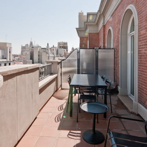 Dine alfresco or enjoy a glass of tinto de verano on the private roof terrace