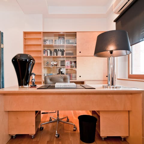 Write a blog about your visit to Spain's capital at your desk