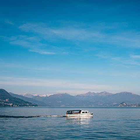 Stay right on the shorefront of Lake Como and watch the boats putter by