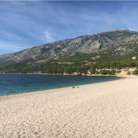 Stay on the island of Brač and sunbathe on Martinica Beach, only a scenic stroll away