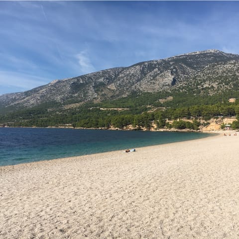 Stay on the island of Brač and sunbathe on Martinica Beach, only a scenic stroll away