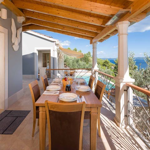 Retreat from the Croatian sunshine and dine alfresco here on your roofed balcony