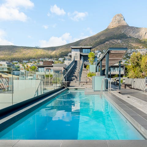 Cool down after a day of exploring the coastline in the shared rooftop pool