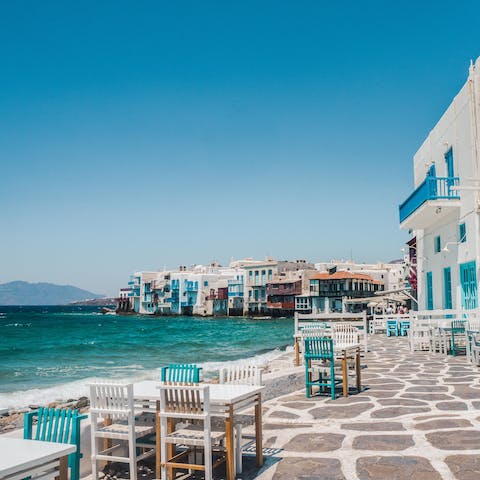 Experience the nightlife of Mykonos Town – it's a short drive away