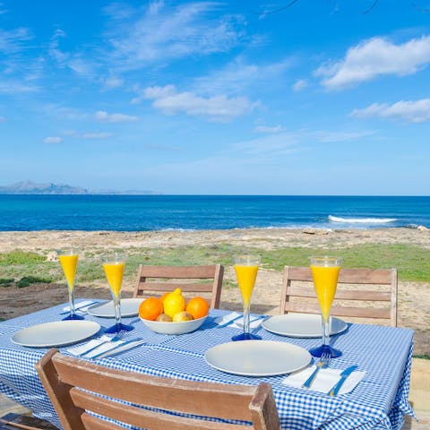 Dine alfresco as sea views stretch out before you