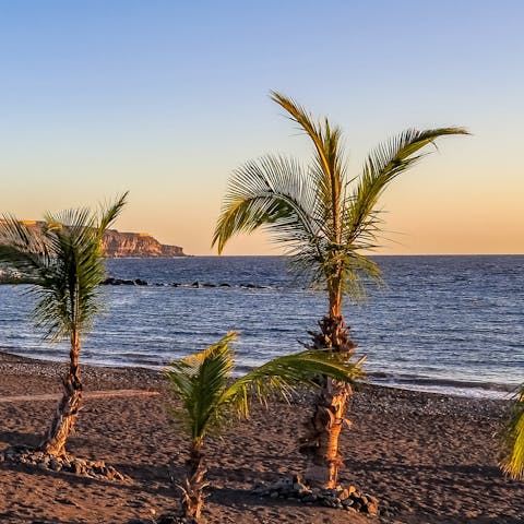 Have a stroll down to the dark sands of Playa de Ajabo, 50 metres away