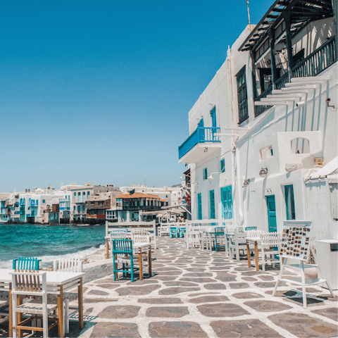 Explore Mykonos Town, a fifteen-minute drive away