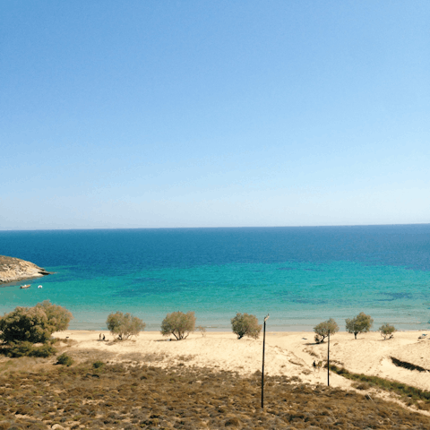 Seek out the sun, sand and sea at Porto Koundouros semi-private beach, just 150m away