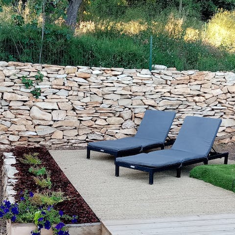 Relax in the sunshine in your newly landscaped gardens