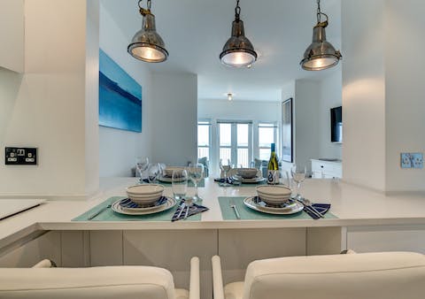  Ship lights hang above the breakfast bar