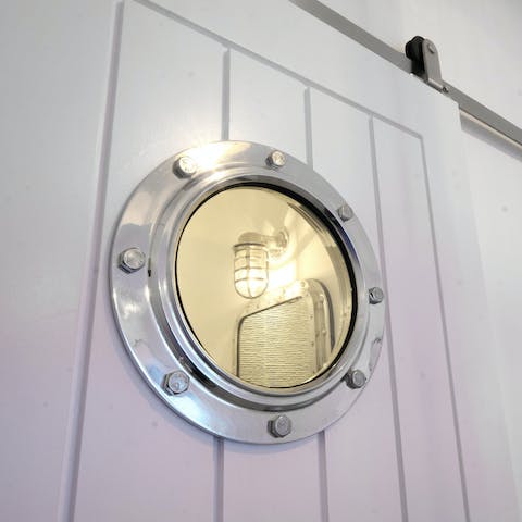 The doors inside have porthole windows