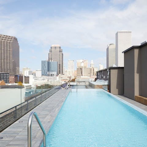 Take a dip in the rooftop pool with skyline views over the Big Easy