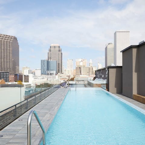 Take a dip in the rooftop pool with skyline views over the Big Easy