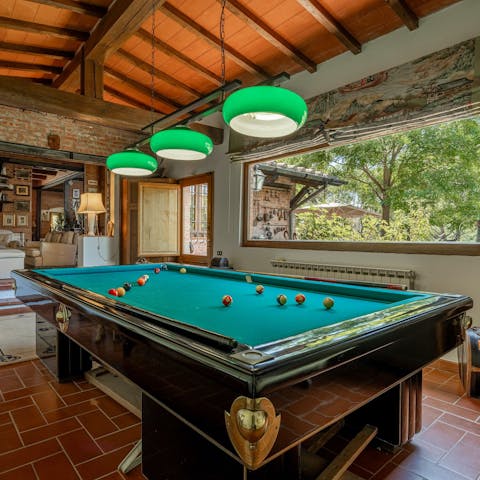 Challenge your guests to a fun game of pool