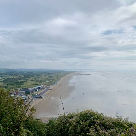 Take a revitalising stroll along nearby Pendine Sands