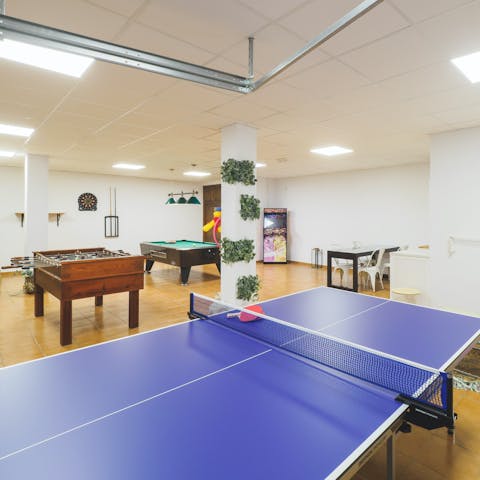 Begin a table tennis tournament in the games room