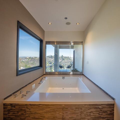 Sink into the soaking tub and admire the views over the canyons