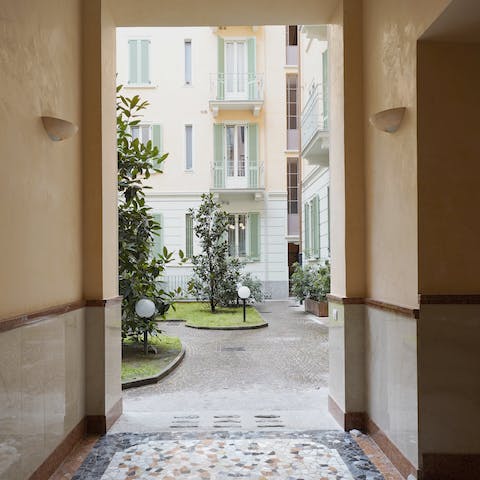 Admire the apartment building's serene courtyard