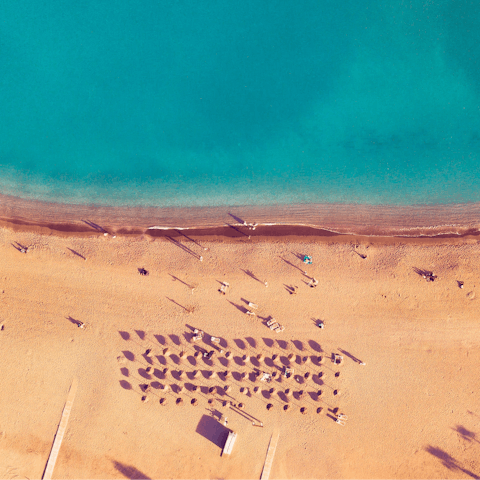 Sink your toes in the sand at Playas de la Malagueta, 2 kilometres away