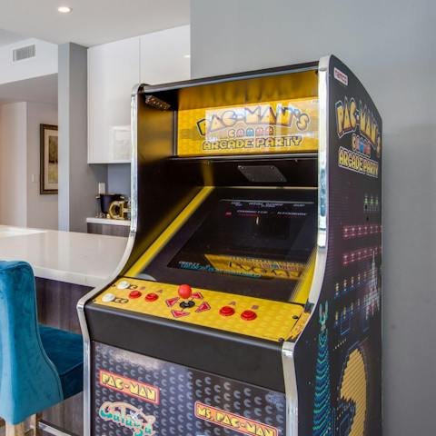 Challenge your friends to a games night of foosball and Pacman, trying to beat eachother's high score