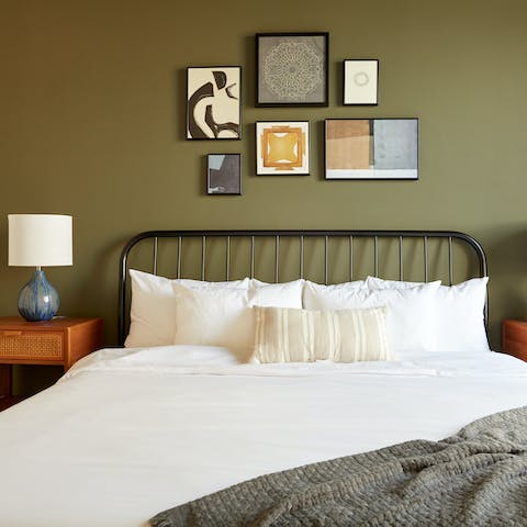 Get some rest in the stylish bedroom after a busy day in Savannah 