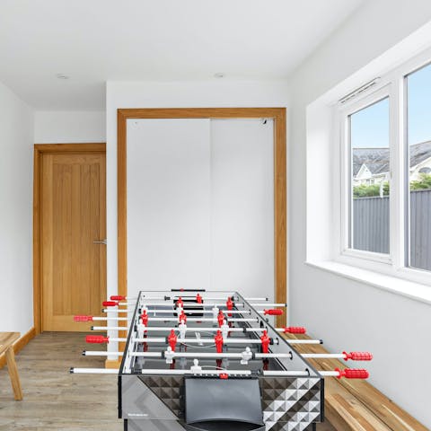 Come together for a lively game of table football