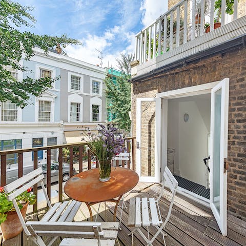 Enjoy lunch on your sunny, private balcony with views over Notting Hill
