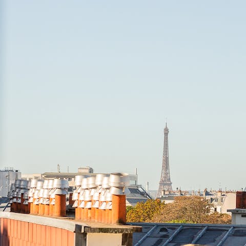 Enjoy the view of the Eiffel Tower from the Juliet balconies