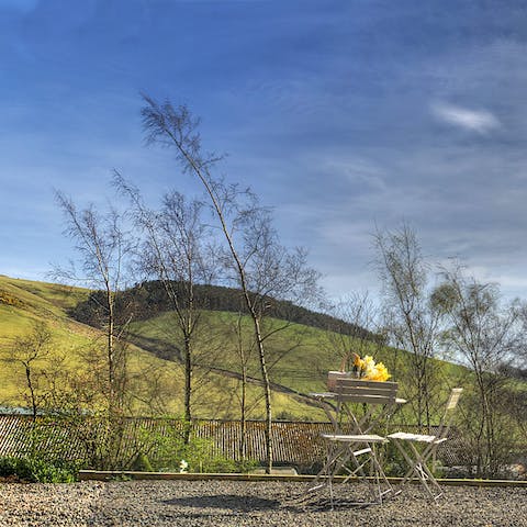 Have a drink in the garden, overlooking the endless countryside