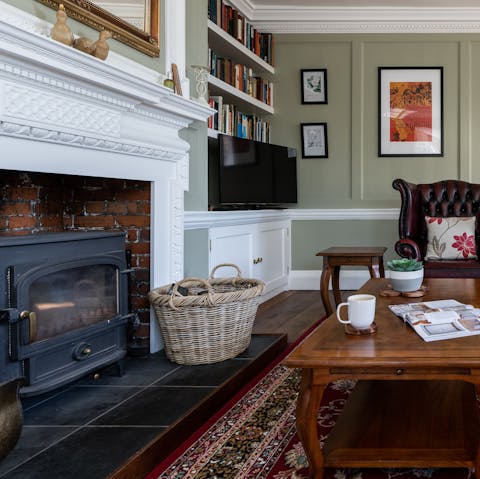 Light up the fireplace and get cosy next to the crackling flames in the living room 
