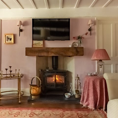 Curl up by the fire with a good book – the best way to spend a rainy afternoon
