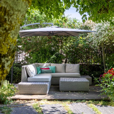 Relax in the alfresco seating area with a glass of Burgundy wine