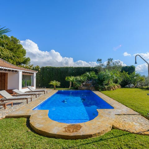 Jump into the home's swimming pool overlooked by Andalusian hillsides