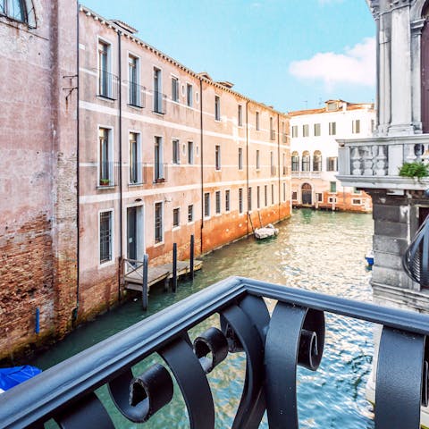 Admire the beautiful views of the Santa Giustina Canal from your private balcony 