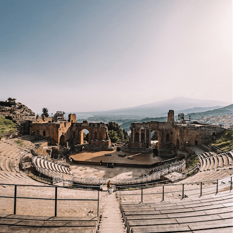 Visit the Teatro Antico di Taormina, a 10km drive away