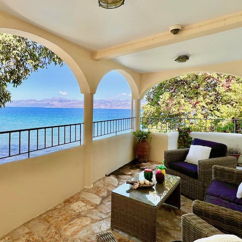 Savour your morning coffee on the veranda, overlooking the sparkling Ionian Sea