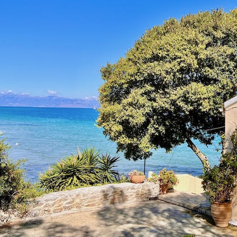 Take the private steps down to the sandy beach of Apraos for an invigorating afternoon swim