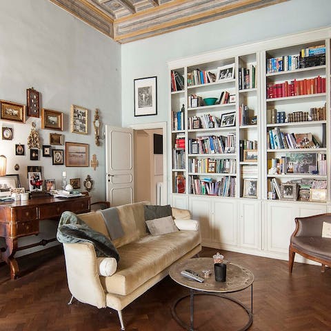 Find a cosy reading spot in the refined library area