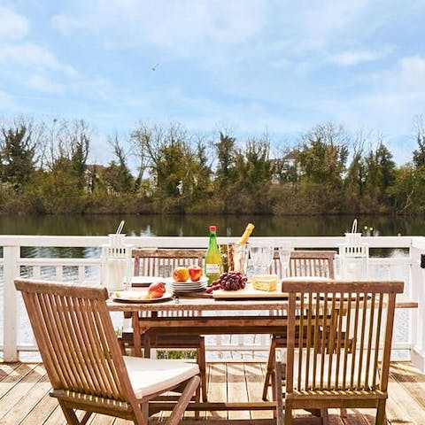 Dine on your private terrace on the lake and listen out for woodpeckers