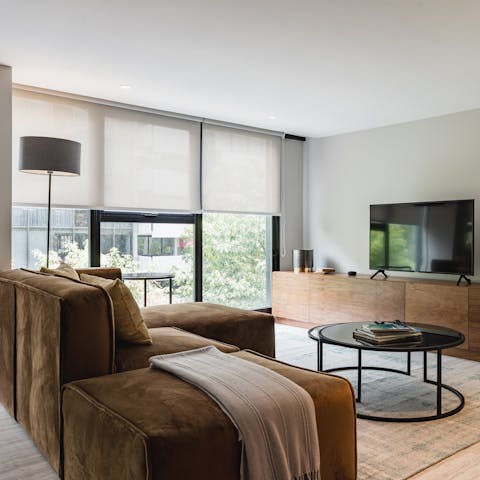 Relax on the huge plush sofa after a day of exploring