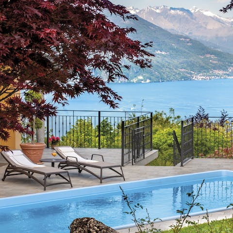 Relax by the private pool with stunning mountain views as a backdrop