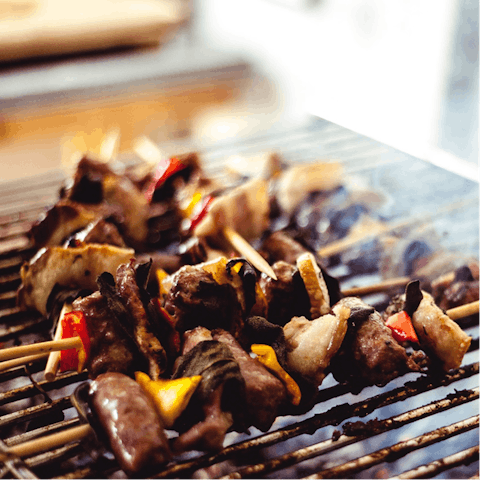 Make use of the communal grill on the rooftop deck